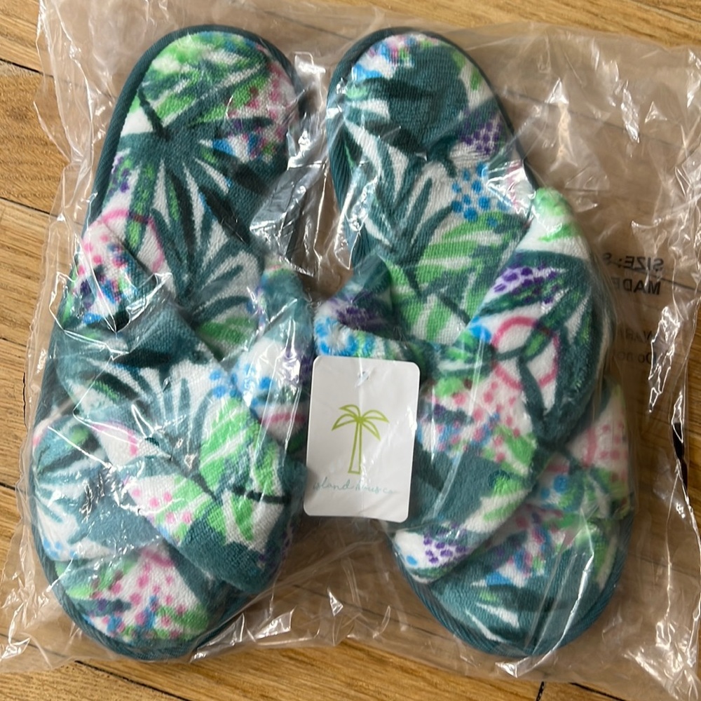Brand new slippers in plastic